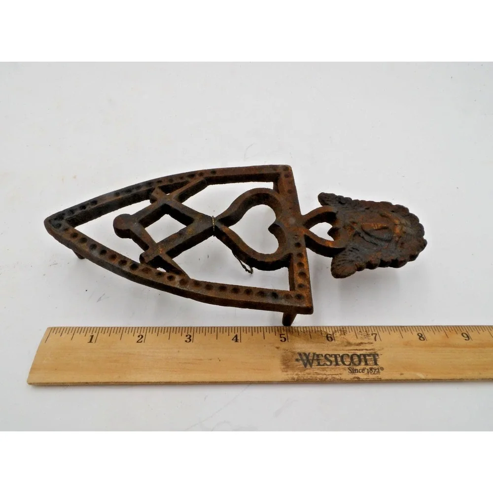 Antique Cast Iron Trivet with Figural Head / Face
